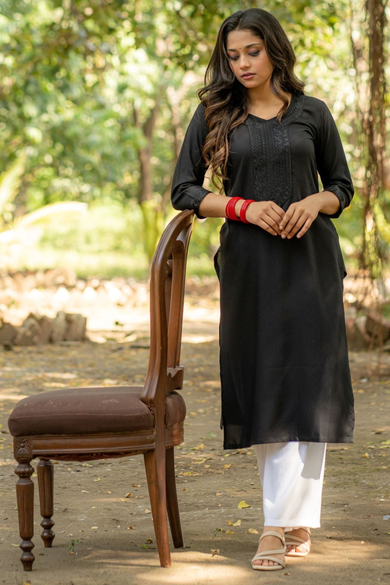 Black Straight Fit Kurti with Embroidered Neckline and Sleeves GulaboSitabo