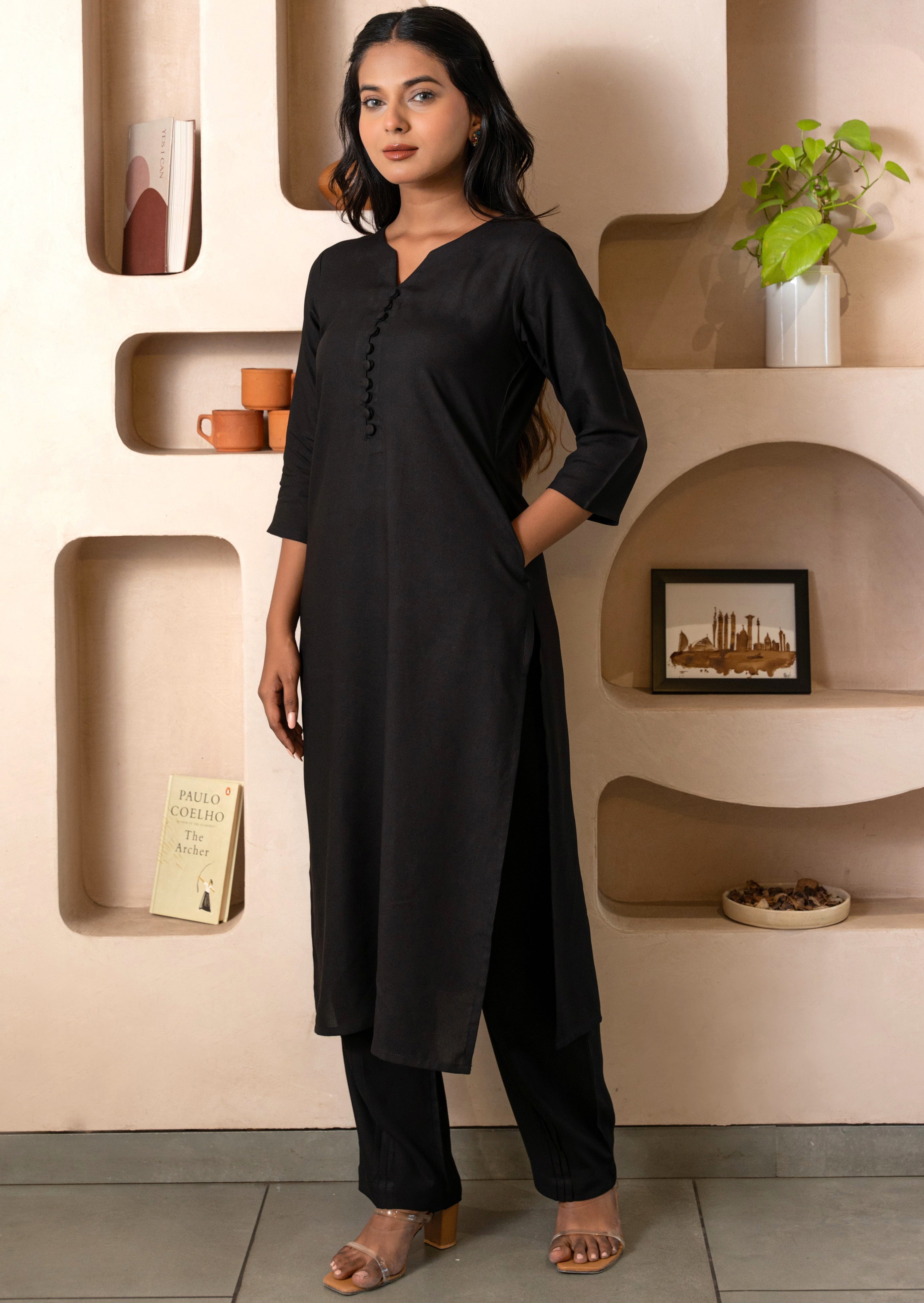 Black Notched Neck with Button loops highlights Straight Fit Kurta