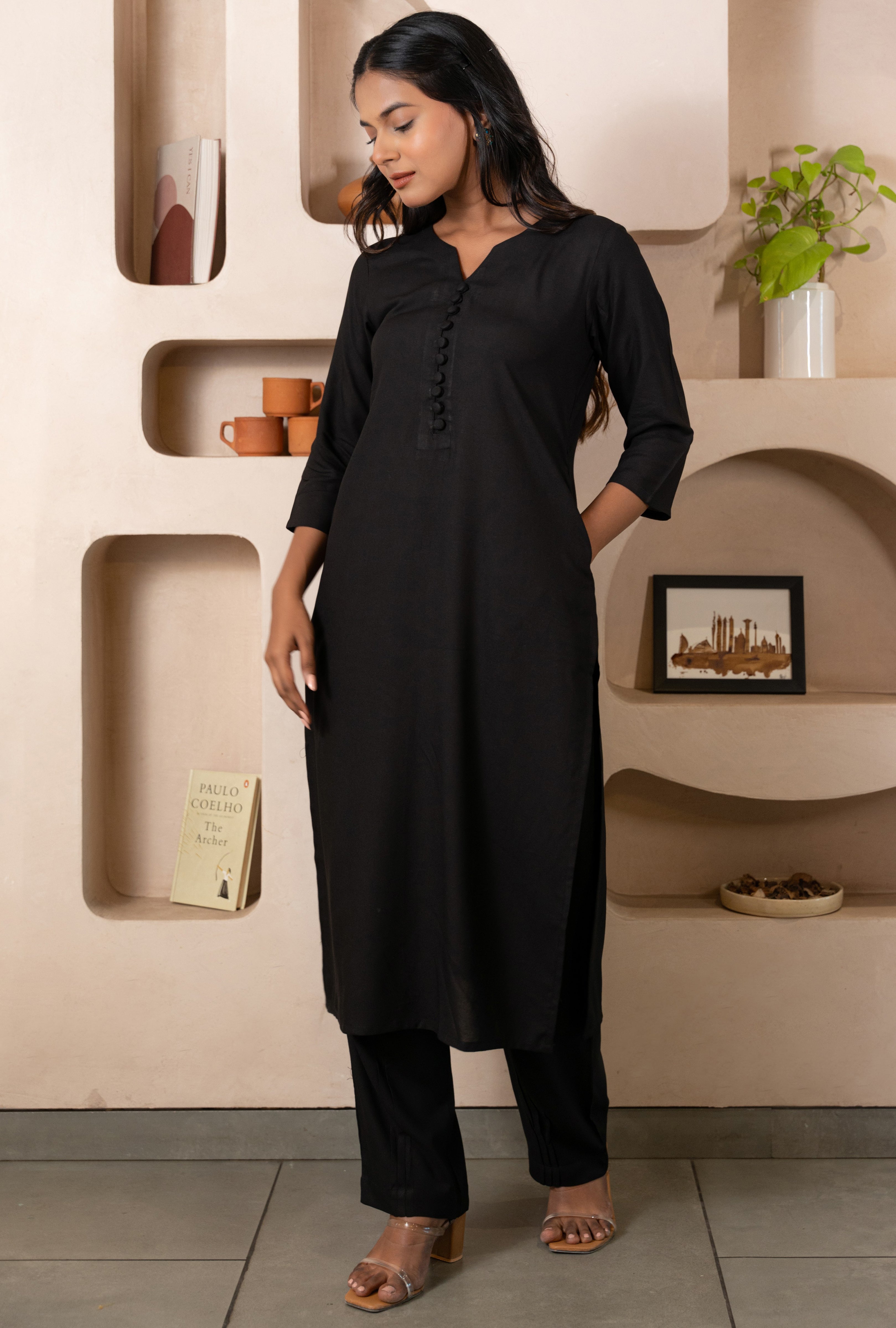 Black Notched Neck with Button loops highlights Straight Fit Kurta