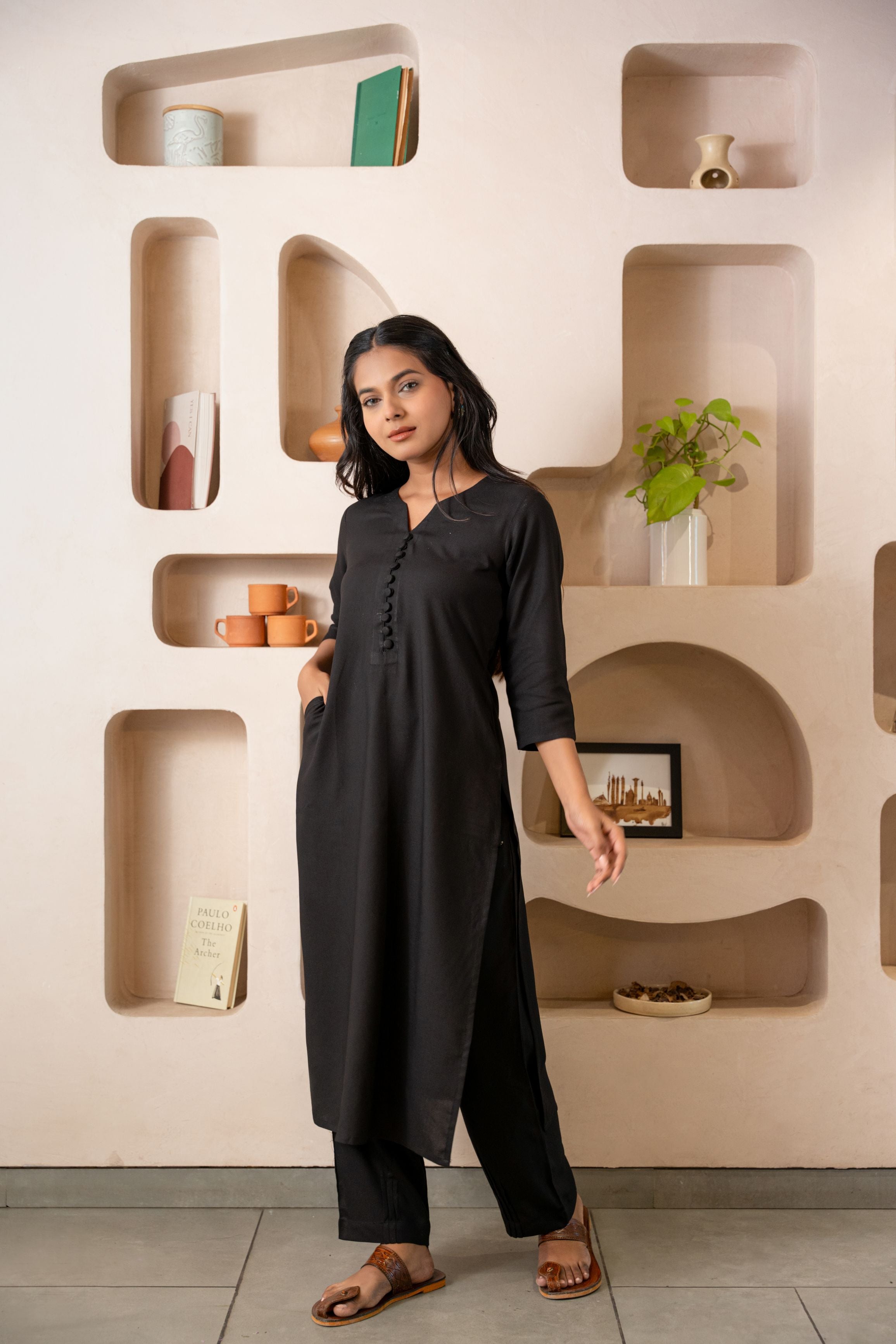 Black Notched Neck with Button loops highlights Straight Fit Kurta