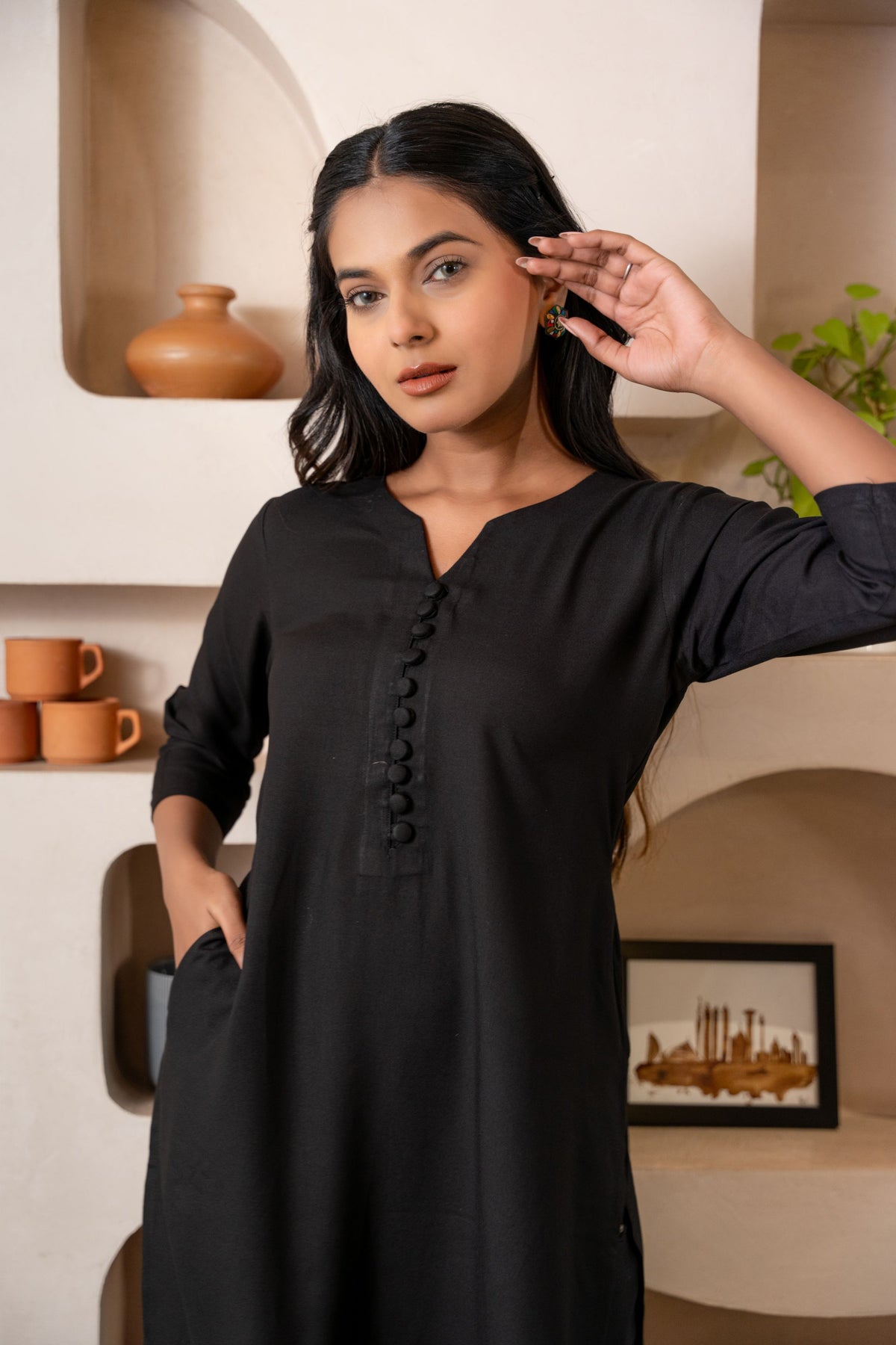 Black Notched Neck with Button loops highlights Straight Fit Kurta